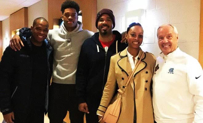 Armando Bacot with his family - mother and father