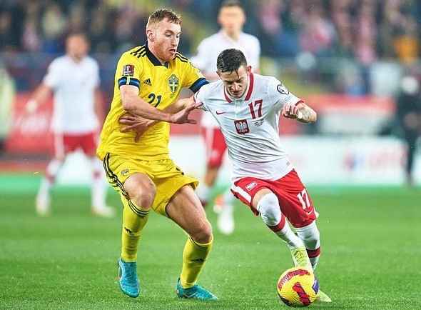 Sebastian Szymanski in action of Poland vs Sweden