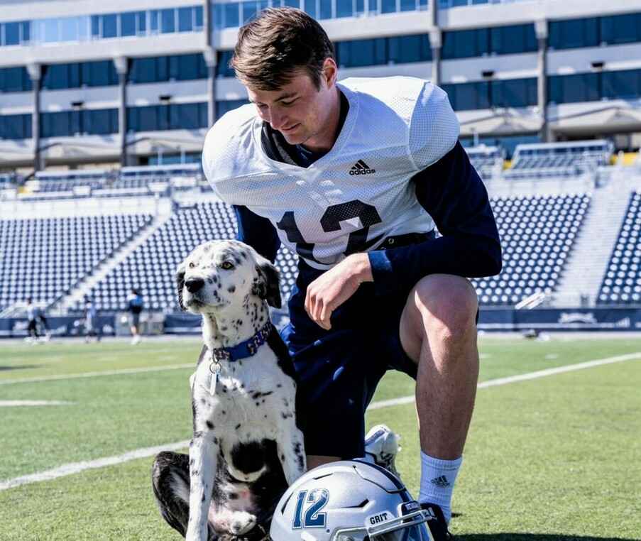 Carson Strong with his pet Dog
